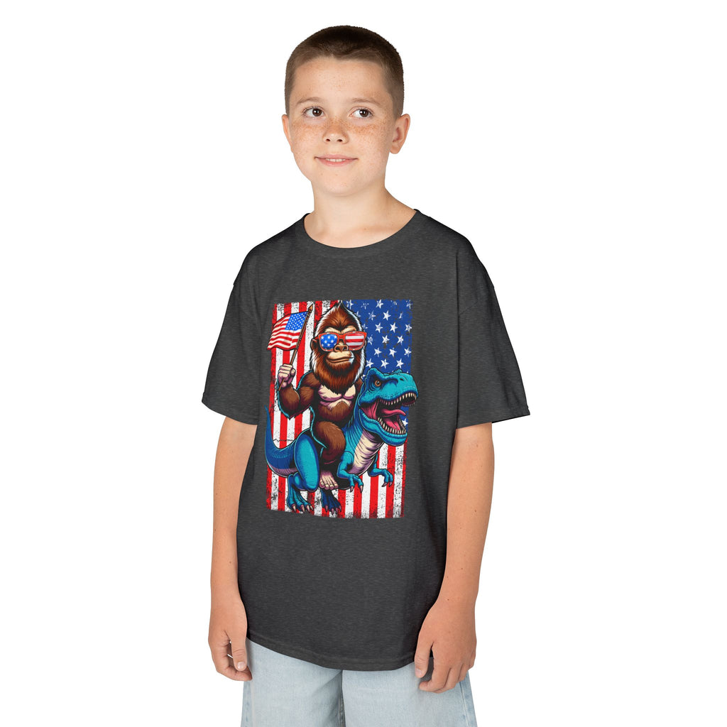 Kids Patriotic Dino Tee – T-Rex Riding Dinosaur with American Flag | Cr8tive Designs
