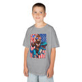 Kids Patriotic Dino Tee – T-Rex Riding Dinosaur with American Flag | Cr8tive Designs